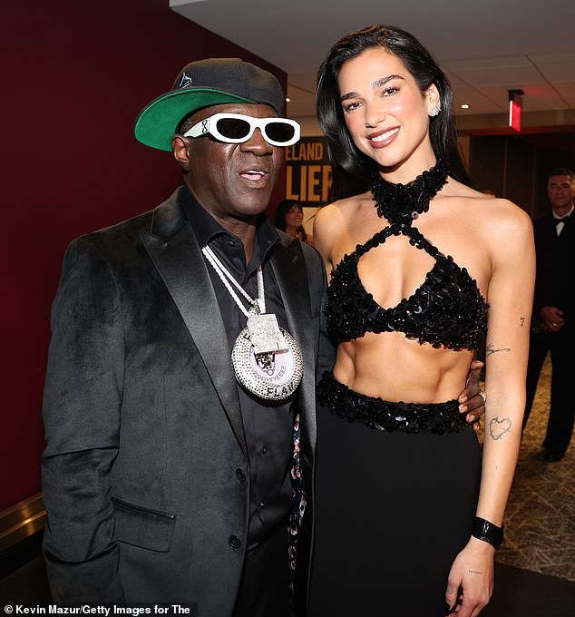 Inside the venue, she was seen posing for a photo with Flavor Flav, 65, before taking the stage to perform at the ceremony.