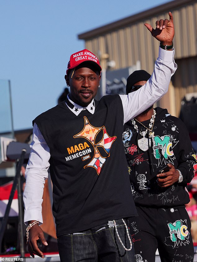 Brown gestures while on stage during the rally in Pennsylvania on Saturday afternoon.