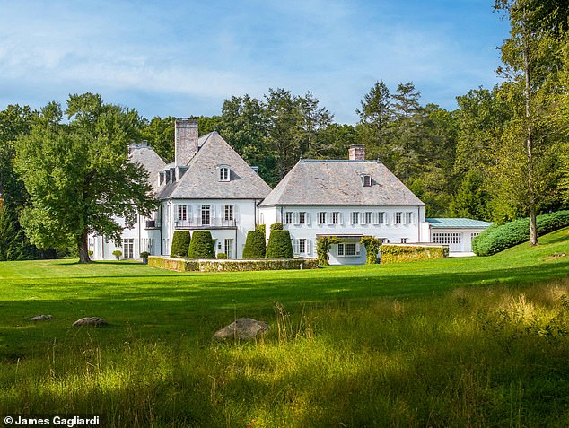 The main residence spans about 14,300 square feet and the entrance to the property is flanked by two front doors: one used as a caretaker's cabin and the other as a gym.