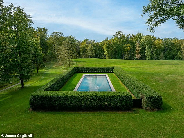 For lounging, the property also features a 60-foot pool lined with antique granite, inspired by a design Delphine saw around a pond in New York's Central Park.