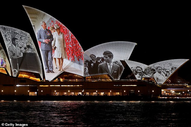 Images from across Charles' life were beamed into the iconic Sydney building.