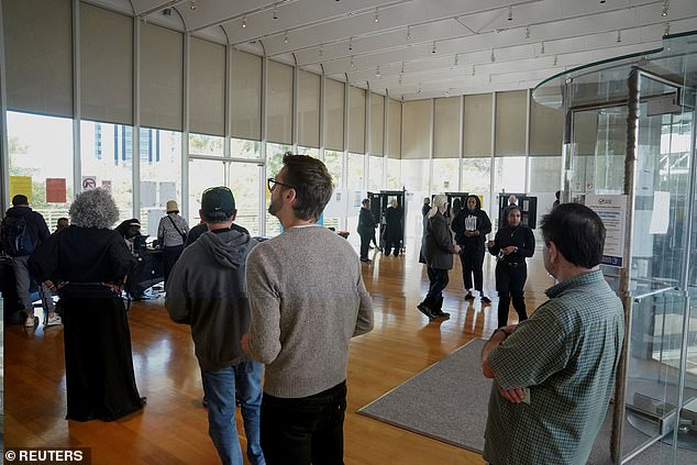 People waiting in line to vote in Atlanta, Georgia, on October 16. More than 1.3 million people have already cast their ballots, as early in-person voting in the state has broken records.