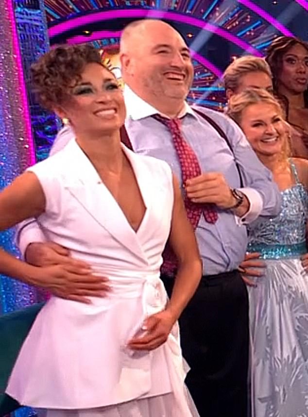 Strictly's Wynne Evans and Katya Jones, as the professional dancer appears to do