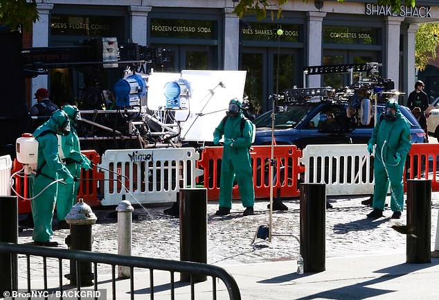 The set took place in front of the Shake Shack restaurant and featured a group of at least four people in protective suits touching the area and spraying some type of liquid into an area that looked like sand.