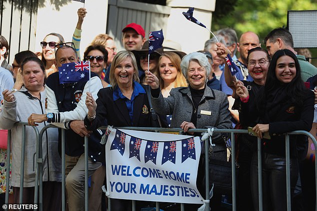 The public held signs that said 