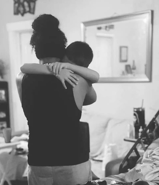 Diarte-Carr's cousin posted a black and white image of a family member hugging her young son as his mother lay dying in bed next to them.