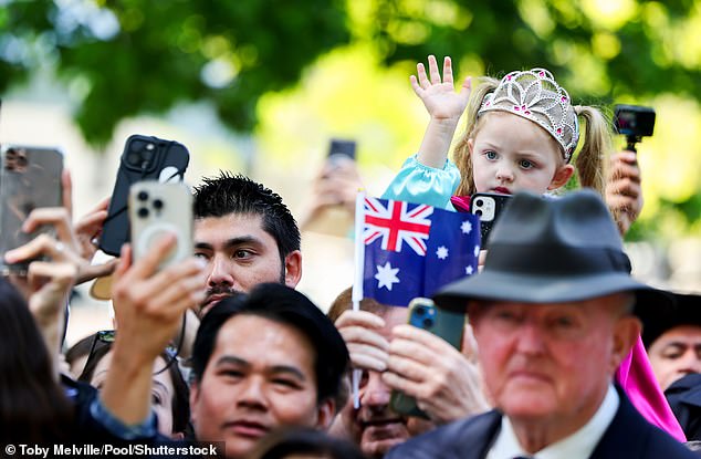 Australians lined the streets of northern Sydney to welcome the Royals, carrying flags and tiaras.