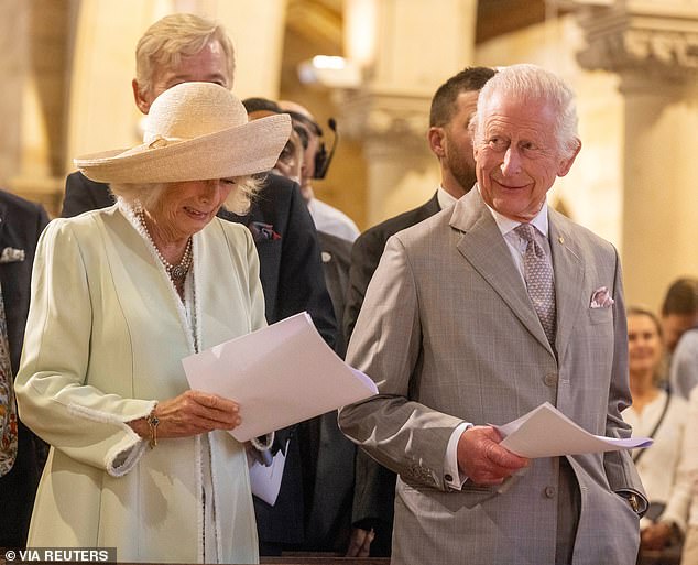 A lone flute could be heard playing God Save the King during the hour-long church service.