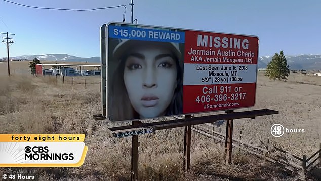 A billboard displays a photo of missing Jermain Austin Charlo offering a $15,000 reward