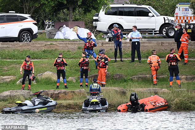 Emergency services rushed to the boat ramp at Shearer Park off Hollywood Drive, Lansvale, on the Georges River, following reports that a woman and two children were in the water 