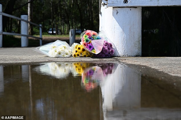 Flowers were left at the boat ramp near where the mother and her two children were first seen in the water.