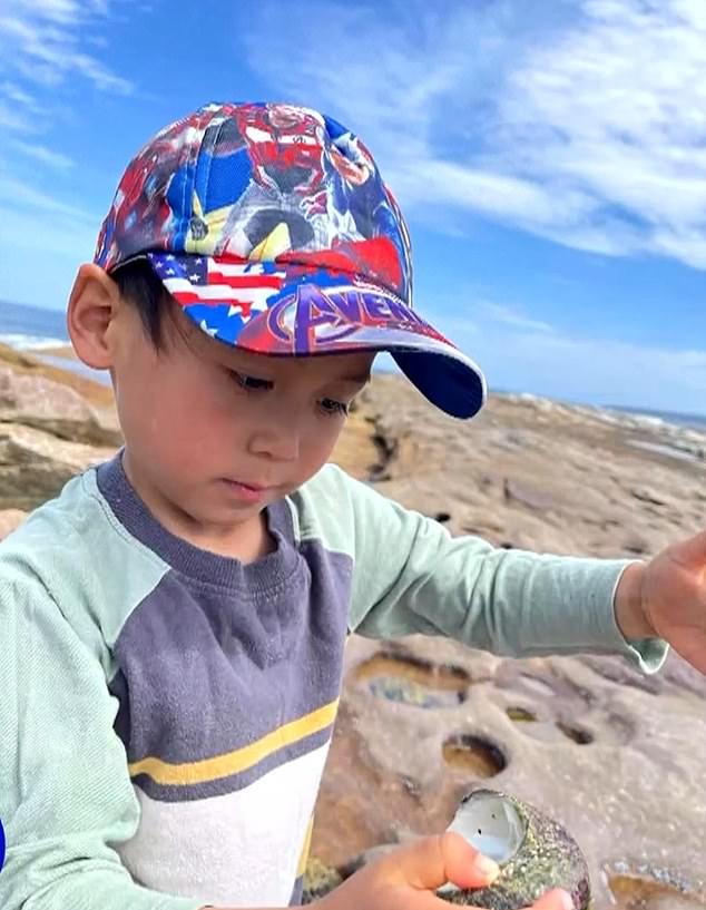 Mitchell Nguyen is seen enjoying a day at the beach as family friends wrote about their shock over the tragedy.