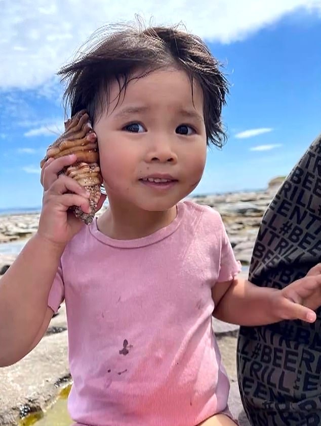 Hazel Nguyen is seen enjoying a day at the beach as her shocked family and friends mourn her.