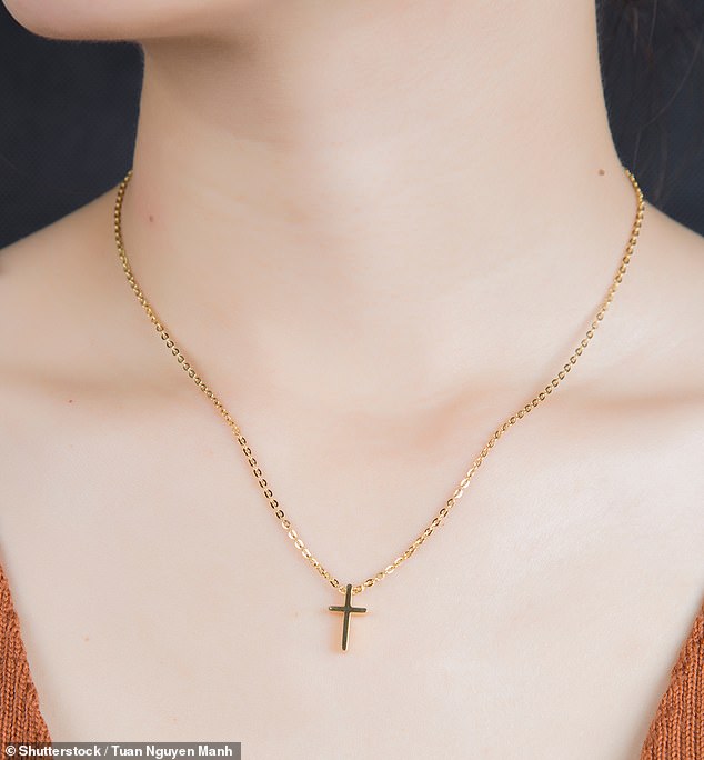 An anonymous student claims the girls were told to remove their cross necklaces because they offended other students.