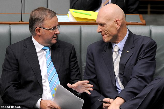 Albanese and Midnight Oil leader Peter Garrett (pictured right) were ministerial colleagues during the Rudd and Gillard Labor governments.