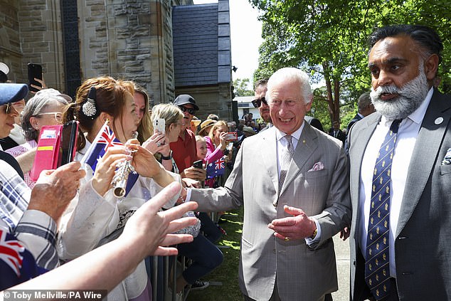 Charles greets the crowd outside after attending a Sunday church service at St Thomas' Anglican Church.