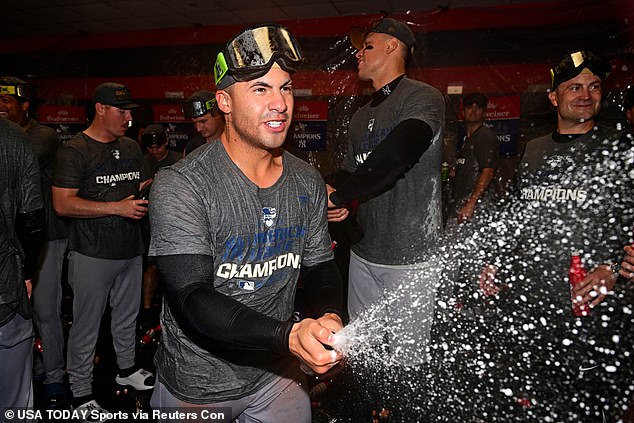 The Yankees took the party to the clubhouse where they let champagne spray.