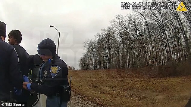 Indiana State Police are seen handcuffing Rajon Rondo about an hour from his native Louisville.