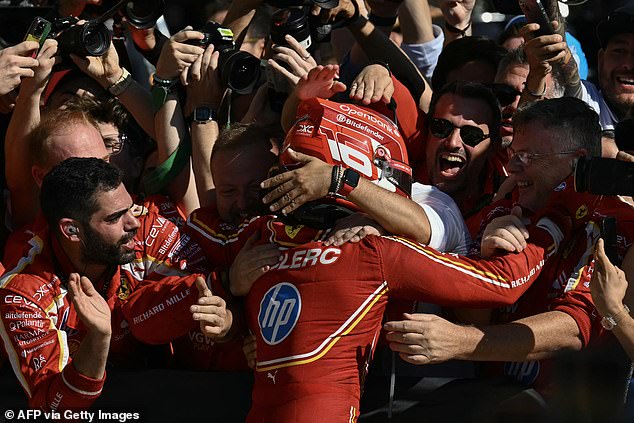 Leclerc pictured celebrating with his team after winning the United States Grand Prix on Sunday.