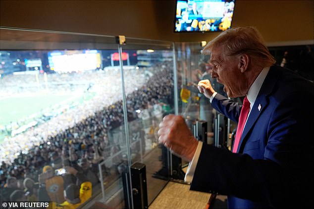 Trump could be seen cheering on the New York Jets during Sunday night's football game.