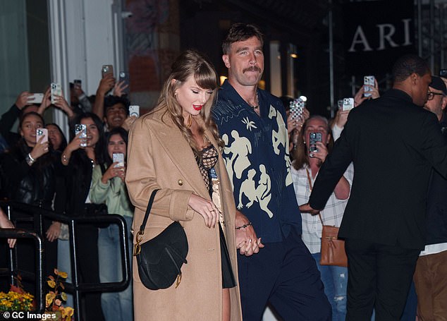 The song may have been a message about her boyfriend Travis Kelce, 35, whom the singer has been dating for over a year (pictured in New York City on October 11).