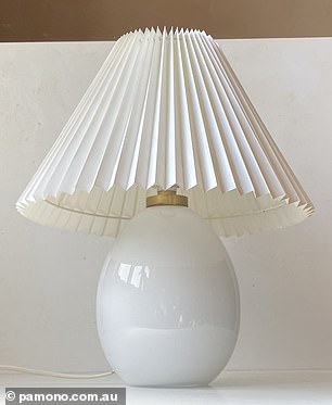 An online vintage decor store is selling a similar lamp, said to be from the late 70s and early 80s, for $1,027.