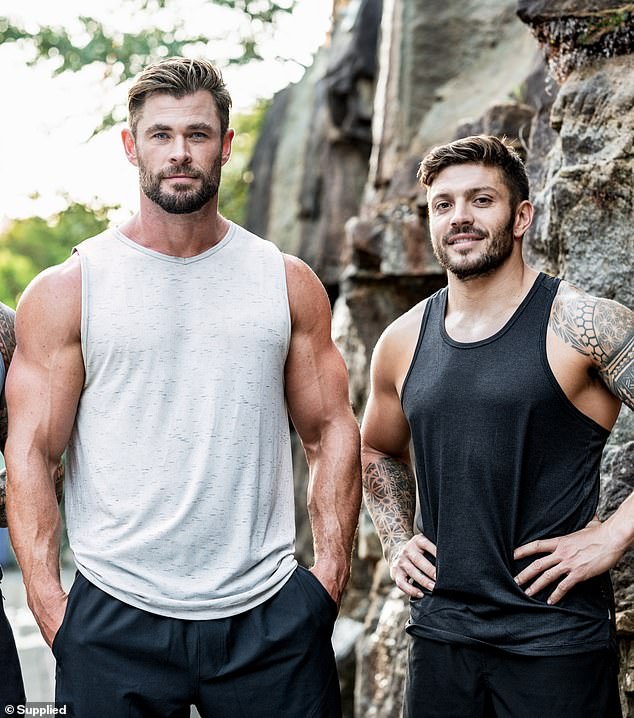 Boyfriend Luke (right), who has been by Hollywood star Chris' side since they were six, has been the man behind Thor's body build for over 12 years. Pictured with Chris