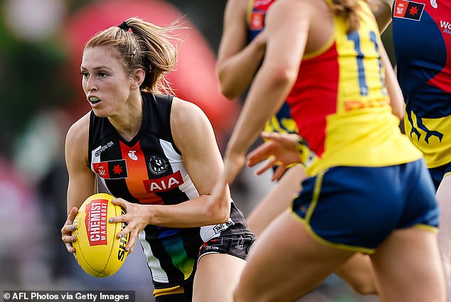 Football legend Dale Thomas says the new footballs feel exactly the same, except they need to be charged before a match (pictured, a smart ball used in Collingwood's round 8 match against Adelaide on the weekend). from last week)