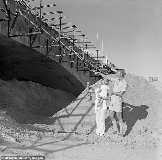 Once the bridge was completed, dynamite was used to fill the new canal underneath with water from Lake Havasu.