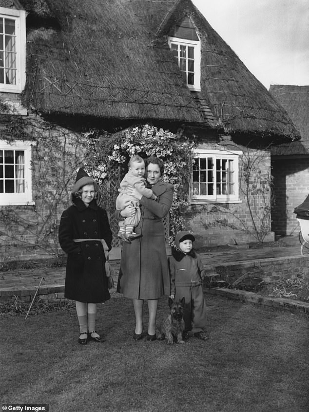 Raine (left) photographed with her mother, Barbara Cartland, and her two brothers Ian (right) and Glen (center) in 1940.