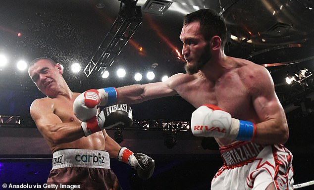 Bakhram Murtazaliev (right) defeated the Australian boxer in three rounds to retain his IBF super welterweight belts.