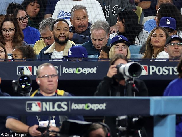 The couple watched from the stands during Game 6 of the National League Championship Series between the New York Mets and the Los Angeles Dodgers at Dodger Stadium.