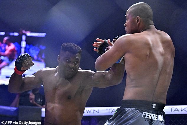 Francis Ngannou (left) produced a stunning KO over Ferreira in the first round of their PFL fight (pictured)