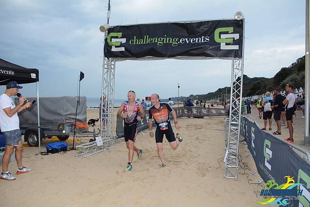 Mark (pictured, right) collapsed while running during the competition in Torremolinos on Thursday.