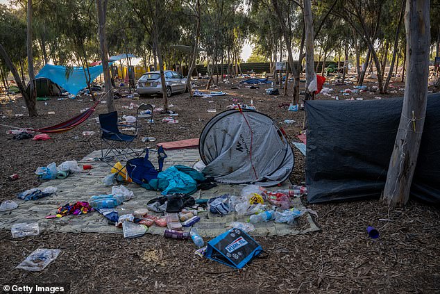 Destroyed cars and personal effects still remain scattered around the site of the Supernova Music Festival, where hundreds were killed and dozens taken away by Hamas militants near the Gaza border, on October 13, 2023 in Kibbutz Re'im, Israel.