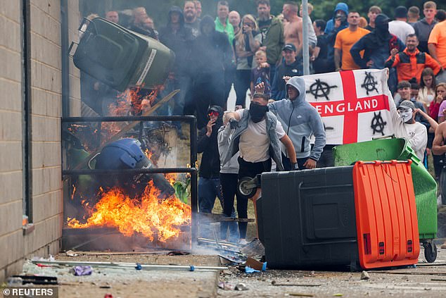 Violent thugs attempted to burn down the hotel supposedly housing asylum seekers and blocked emergency exits in Rotherham on August 4.