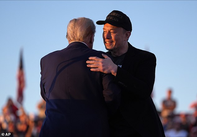 Tesla CEO Elon Musk (right) joins former US president and Republican presidential candidate Donald Trump during a campaign rally at the site of his first assassination attempt in Butler, Pennsylvania.