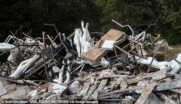 Debris from Hurricane Helene piles up on land owned by the city of Asheville