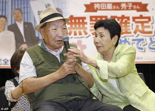 Former Japanese death row prisoner Iwao Hakamada, left, and his sister Hideko Hakamada attend a meeting of supporters in Shizuoka, central Japan, on Oct. 14, 2024.