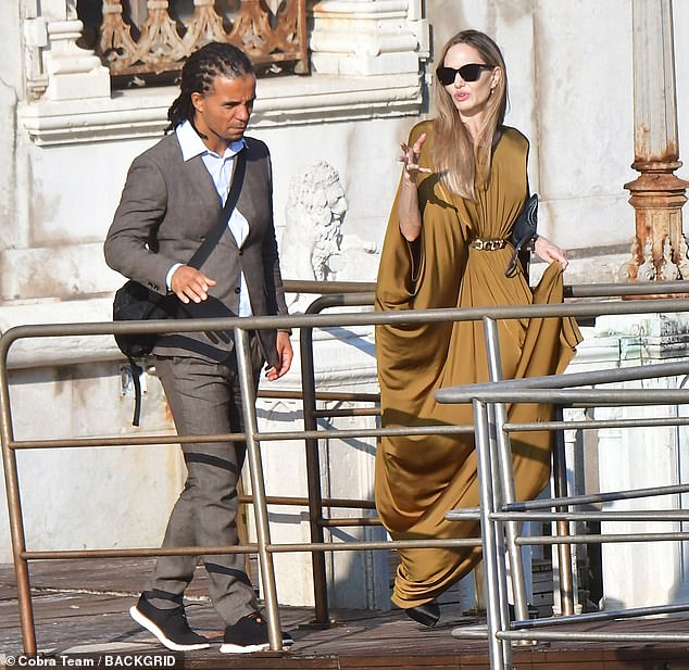 According to inside sources, Akala has been teaching Angelina Jolie a lot about Black British history (pictured at the Venice Film Festival in August).