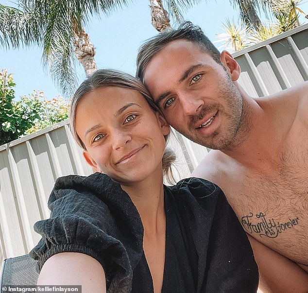 The social media influencer has been battling bowel and lung cancer after she was diagnosed with the cancer in November 2021 following the birth of the couple's daughter. Pictured with her husband, Port Adelaide star Jeremy Finlayson.