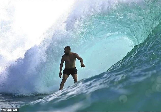 The one-time professional surfer (pictured) was also a surf coach and couldn't wait to hit the waves with his son.