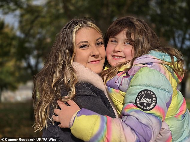 Lisa Bancroft (pictured with her daughter Emma) discovered she had the defective gene. She underwent a precautionary double mastectomy four years ago and now, at 32, remains cancer-free.