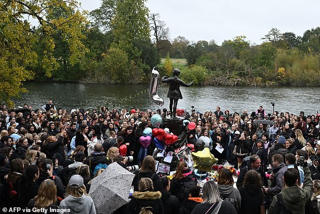 Fans remember Liam Payne at the Peter Pan statue in Kensington Gardens in London on Sunday.