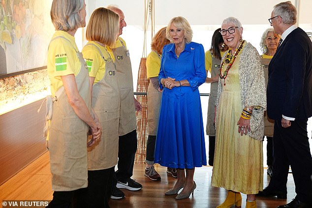 Meanwhile, the Queen was inducted into the Order of the Teaspoon as she helped serve professional chef food to vulnerable customers.