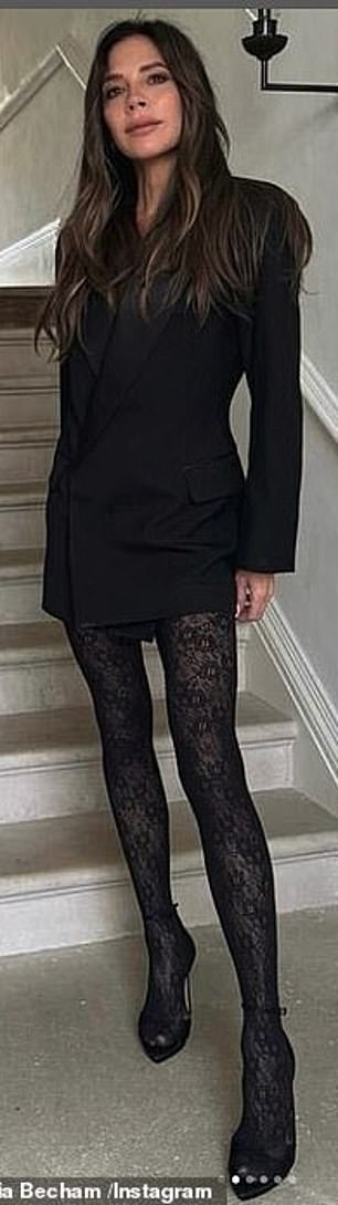 Victoria opted for a black blazer mini dress and black lace stockings as she put on a long-legged display.