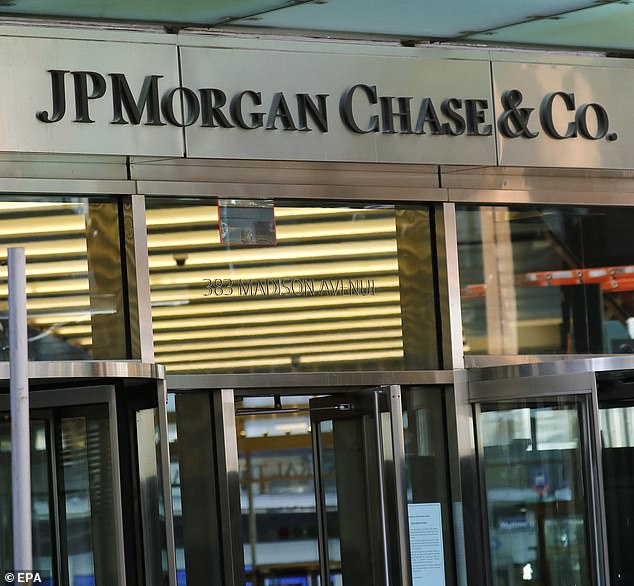 At JP Morgan, junior staff are already required to enter their hours on timesheets (file photo)