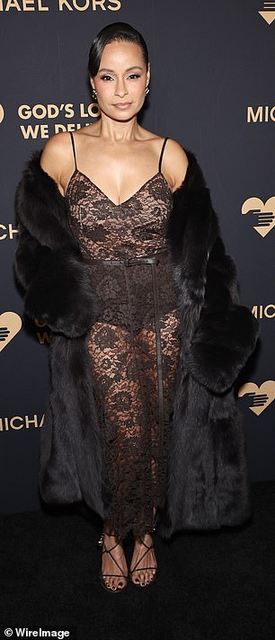 Sai De Silva wore a black fur coat over a sheer lace look