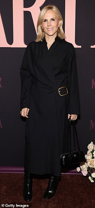 Designer Tory Burch, 58, was also in attendance and looked stylish as always in an oversized black coat with a gold buckle.