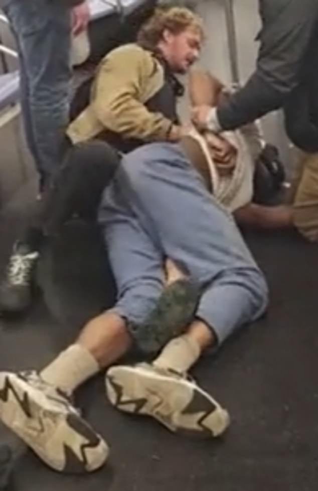 He was caught on video grabbing Neely and strangling him after witnesses said he began acting erratically on a crowded F train.